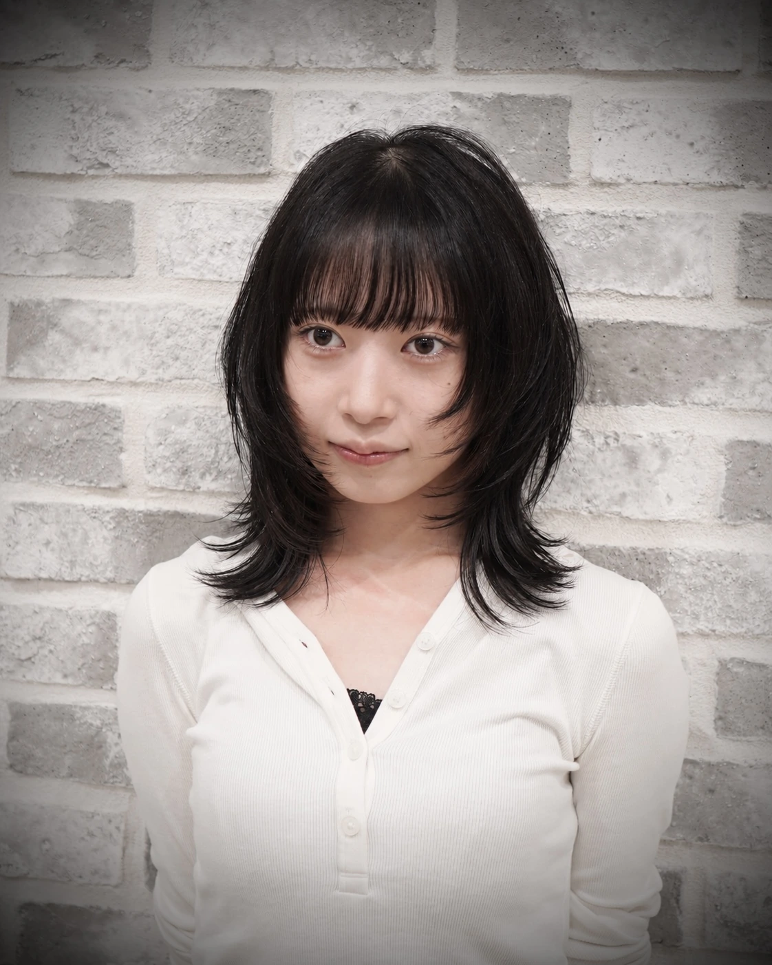 女性レイヤーカットの仕上がり例